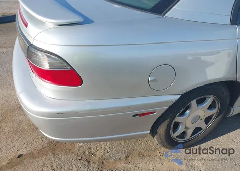 1999 Cadillac Catera z USA, uszkodzony, nr VIN W06VR54R9XR122977